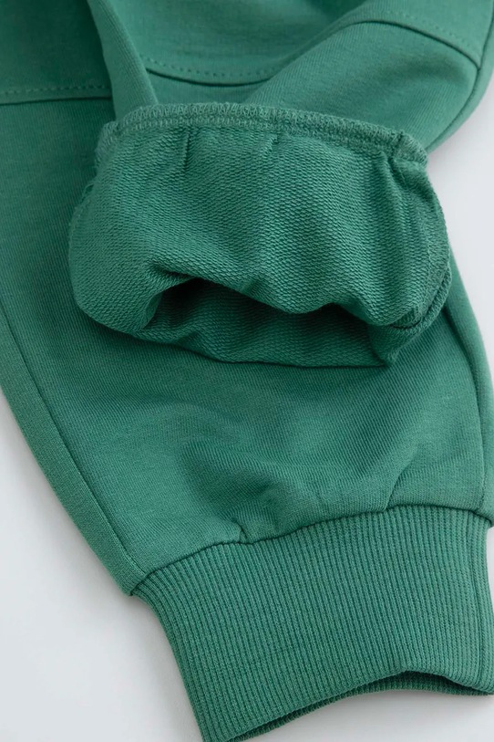 Coccodrillo spodnie dresowe bawełniane dziecięce zielony ZC5120103XBK