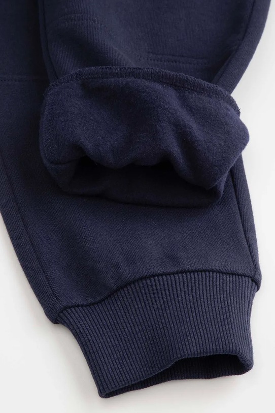 Detské tepláky Coccodrillo tmavomodrá ZC5120201YBK