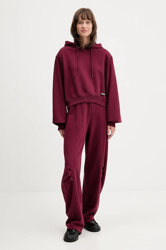 Rotate spodnie dresowe bawełniane 1143882734 bordowy AW25