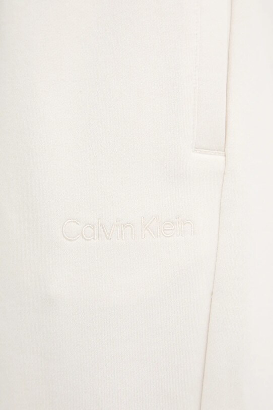 Calvin Klein spodnie dresowe bawełniane beżowy LV044C904G