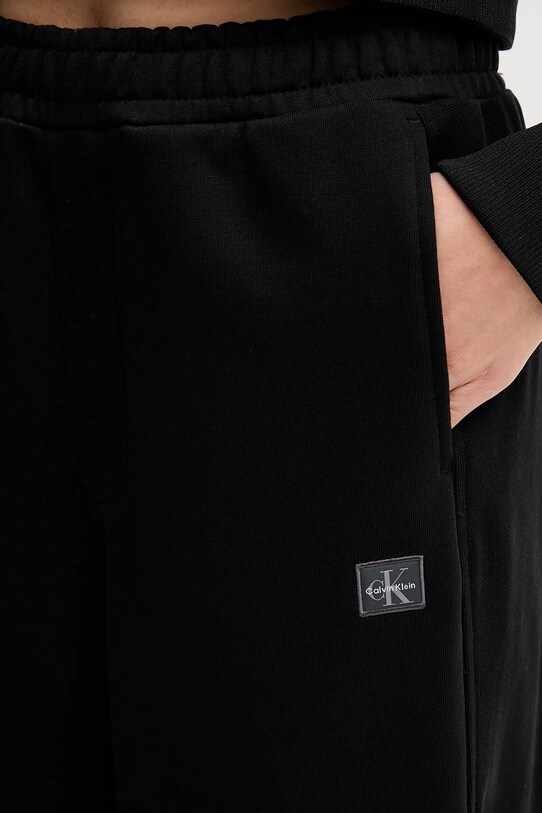 Tepláky Calvin Klein Jeans LV047C249G černá
