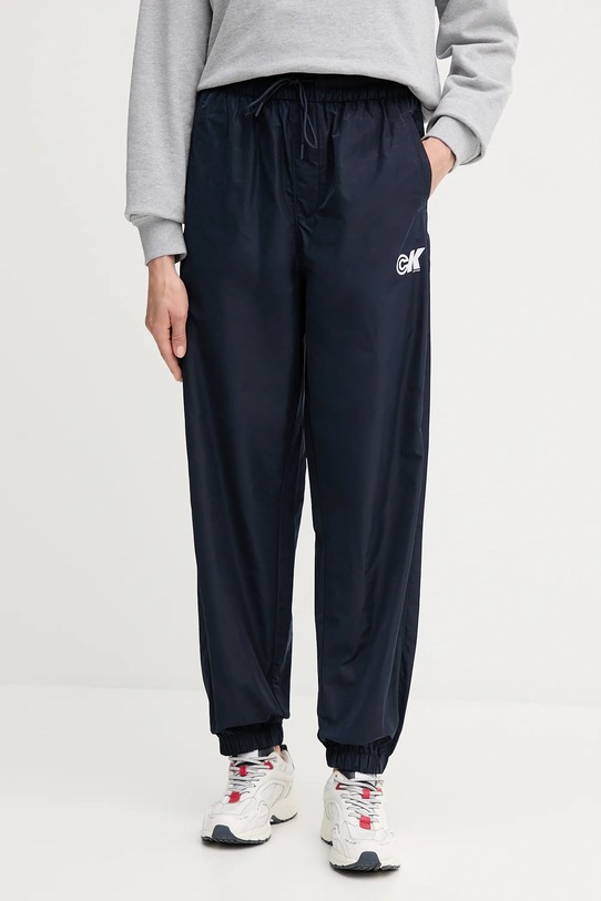 Tepláky Calvin Klein Jeans látka námořnická modř LV047C627G