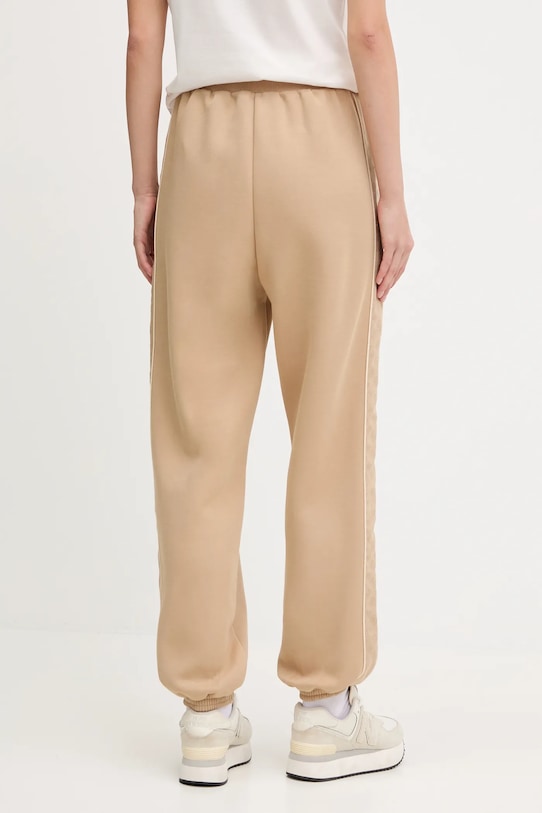 Odzież Guess spodnie dresowe dziecięce MARYELLA V5YB02.KB3P2 beżowy