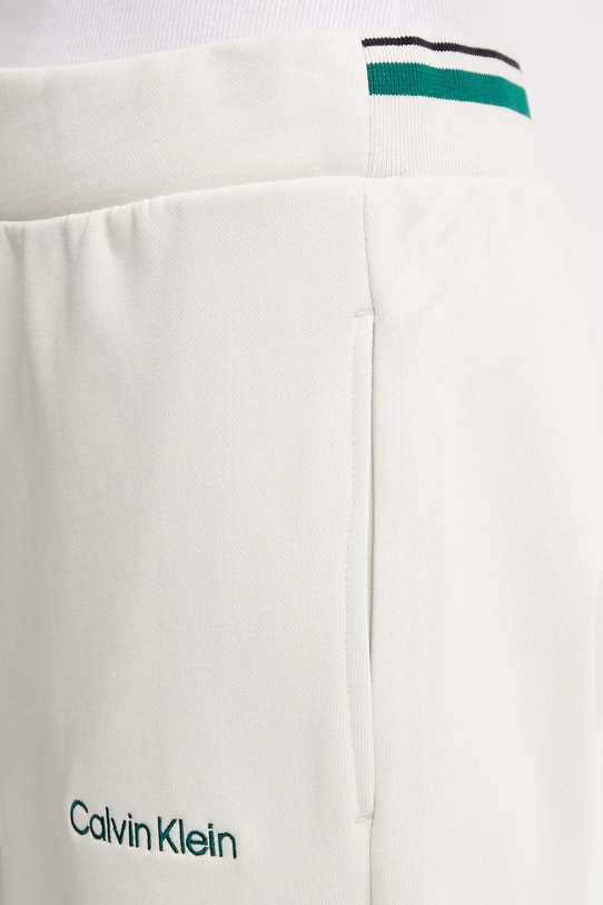 Calvin Klein Performance spodnie dresowe beżowy LVGWF5P627