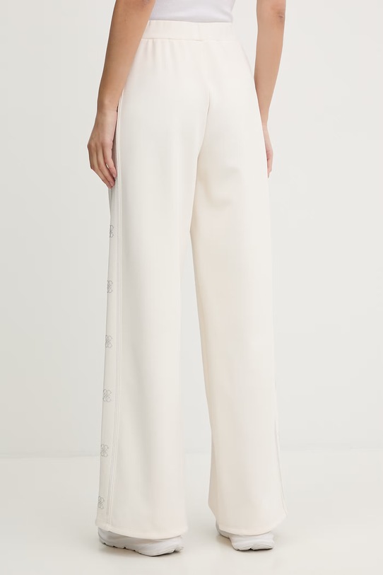 Odzież Guess spodnie dresowe OCTAVIA V5BB12.KCX22 beżowy