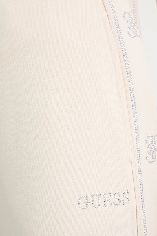 Tepláky Guess OCTAVIA béžová V5BB12.KCX22