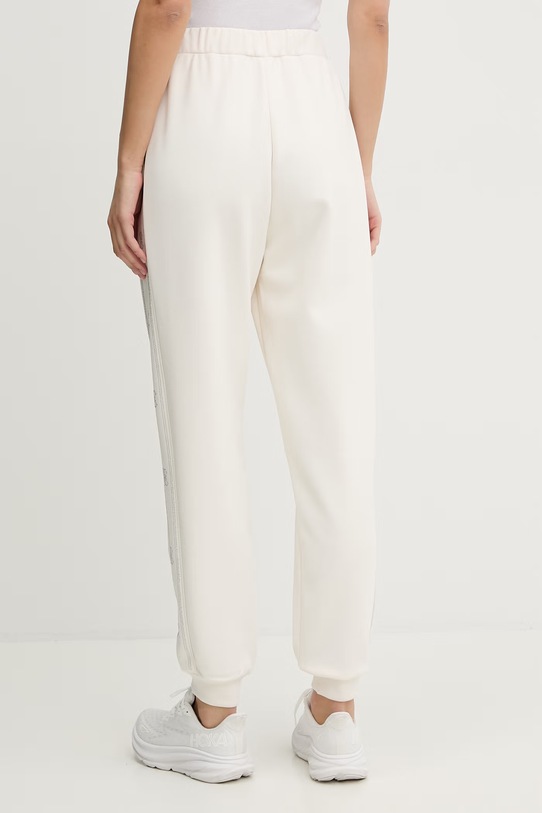 Odzież Guess spodnie dresowe OCTAVIA V5BB23.KCX22 beżowy