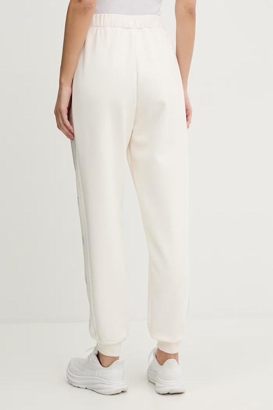 Odzież Guess spodnie dresowe OCTAVIA V5BB23.KCX22 beżowy