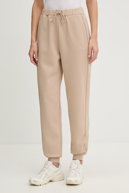 Guess spodnie dresowe OCTAVIA aplikacja beżowy V5BB23.KCX22