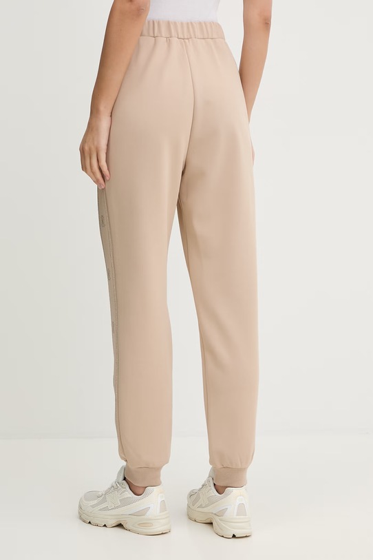 Odzież Guess spodnie dresowe OCTAVIA V5BB23.KCX22 beżowy