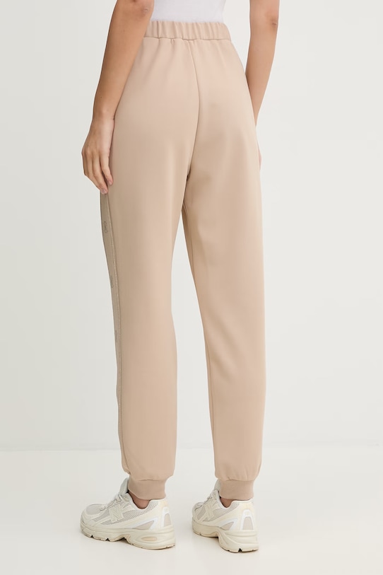 Odzież Guess spodnie dresowe OCTAVIA V5BB23.KCX22 beżowy