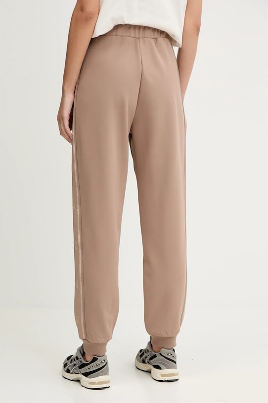 Odzież Guess spodnie dresowe OCTAVIA V5BB23.KCX22 brązowy