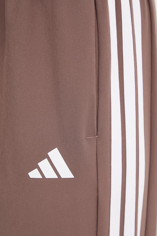 adidas Performance spodnie treningowe Train Essentials brązowy JY2168