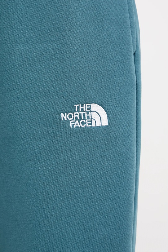 The North Face melegítőnadrág Essential Relaxed türkiz NF0A8C1GBQ51