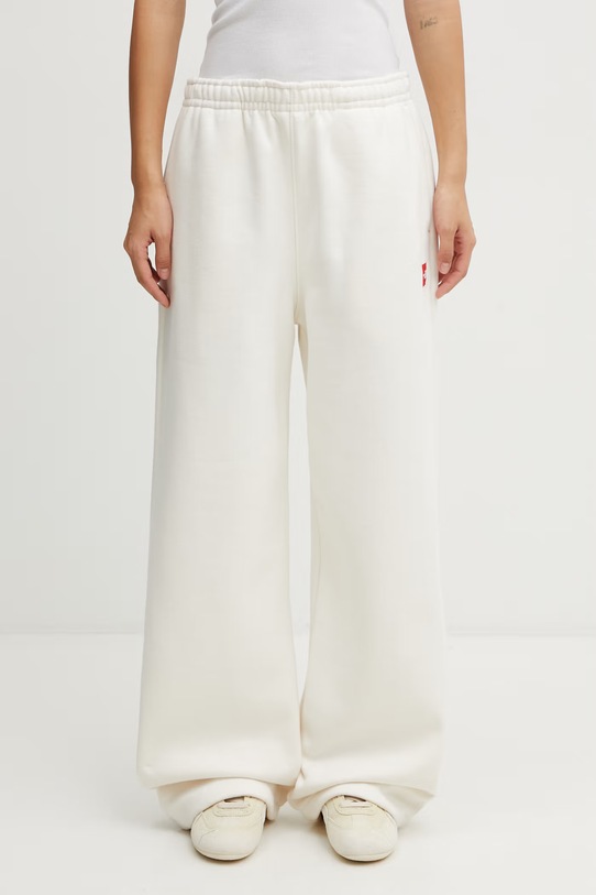 The North Face spodnie dresowe Redbox gładkie beżowy NF0A8EG2QLI1