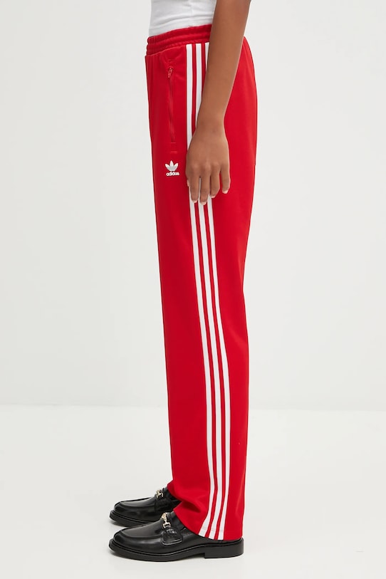 Tepláky adidas Originals Classic Tp nášivka červená JV7392