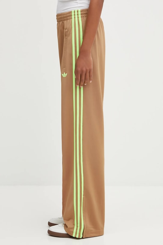 Tepláky adidas Originals Firebird Tp hladký zelená JW1230