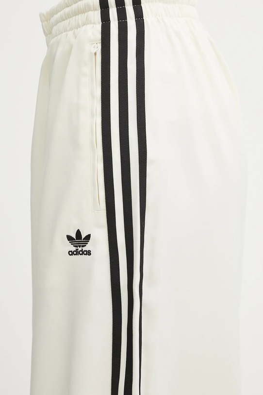 adidas Originals spodnie dresowe Satin Tp Wl beżowy KD2542