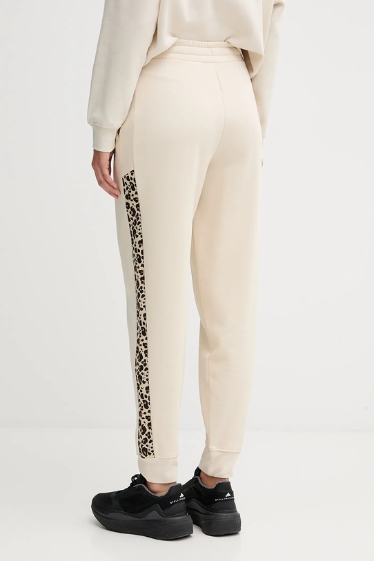 Odzież Puma spodnie dresowe 688086 beżowy