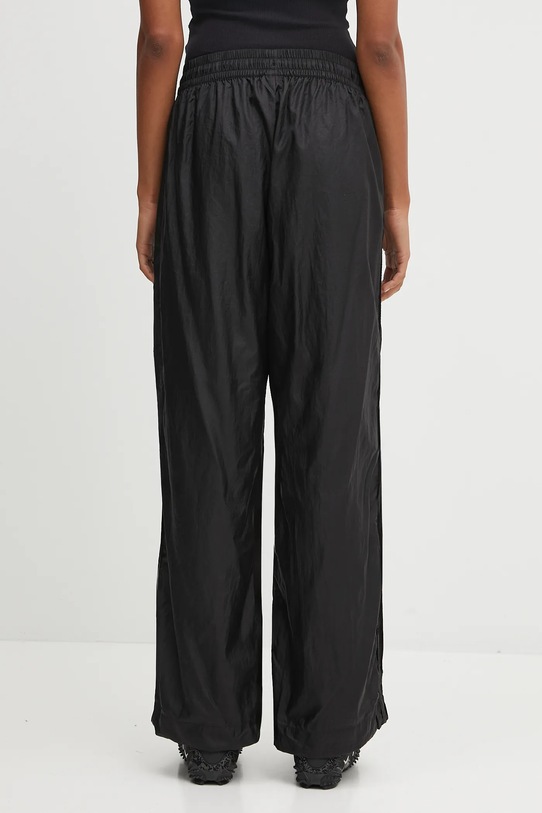 Oblečenie Tepláky Puma PUMA x ROSÉ 633796 čierna