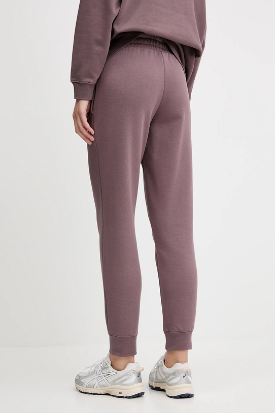 Одежда Спортивные штаны Puma 682467 фиолетовой