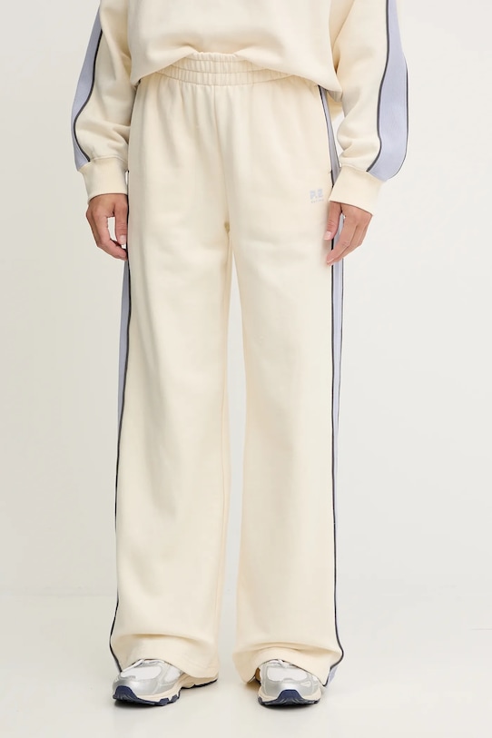 P.E Nation spodnie dresowe bawełniane Align aplikacja beżowy 253P173