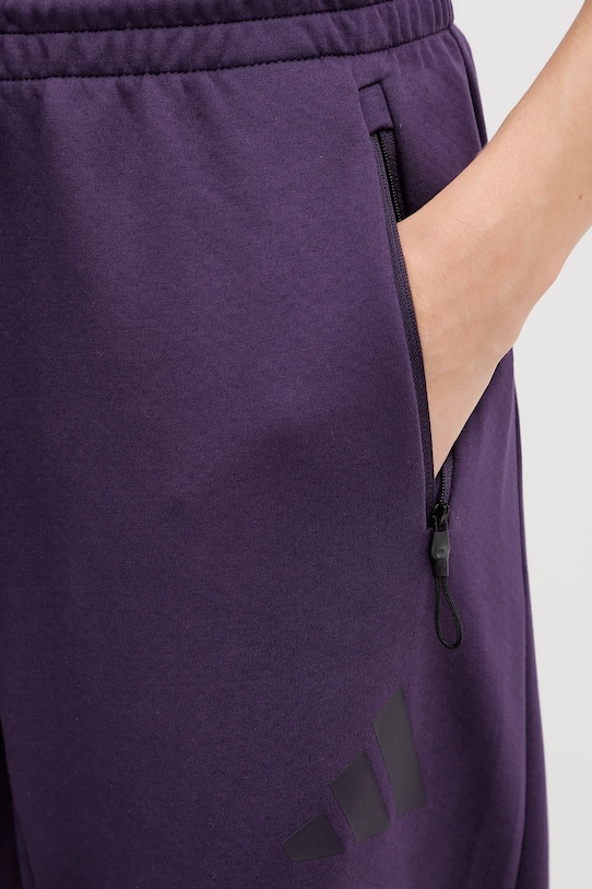 Спортивні штани adidas adidas x Z.N.E фіолетовий KB9441