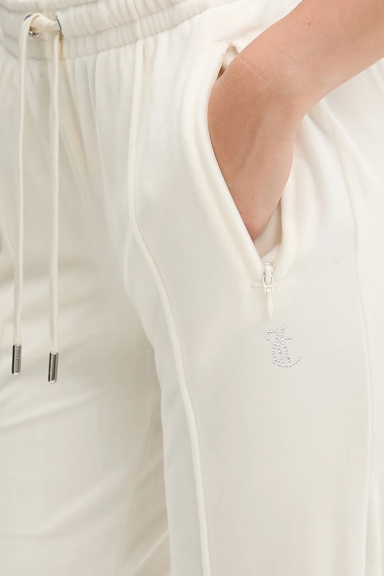 Juicy Couture spodnie dresowe welurowe beżowy JCWBJ225307