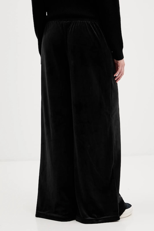 Ρούχα Βελούδινο παντελόνι φόρμας Juicy Couture JCWBJ225309 μαύρο