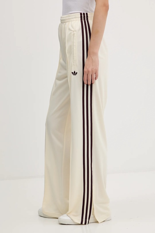 Odzież adidas Originals spodnie dresowe Firebird KA7744 beżowy