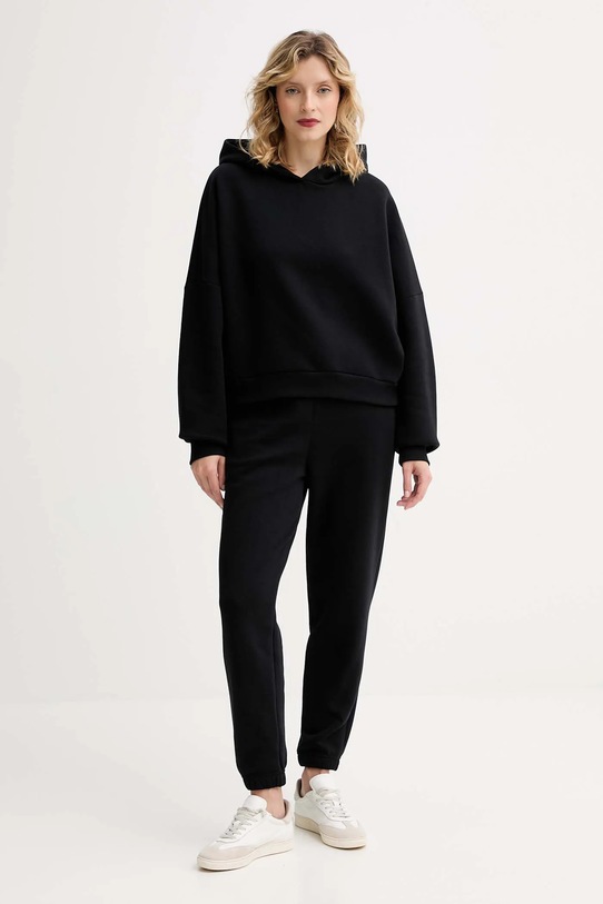 Спортивні штани MUUV. MUUV. x Answear DRESOWE.NISKI.STAN.RAIZ чорний AW25