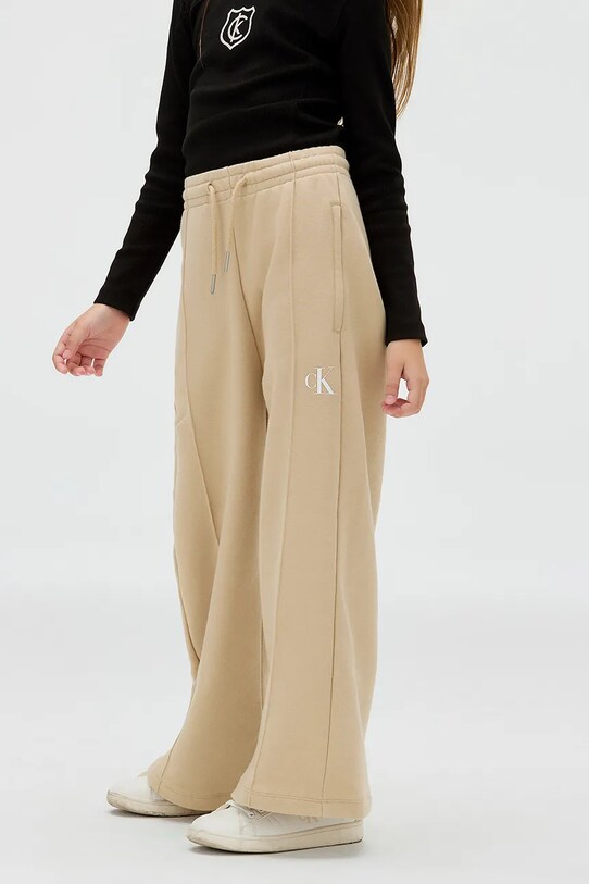 Calvin Klein Jeans spodnie dresowe dziecięce IG0IG02875.9BYA beżowy