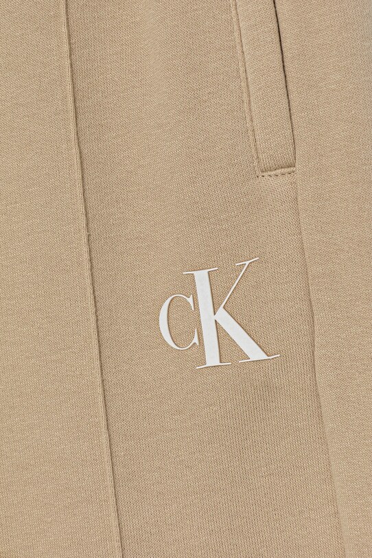 Calvin Klein Jeans spodnie dresowe dziecięce beżowy IG0IG02875.9BYA