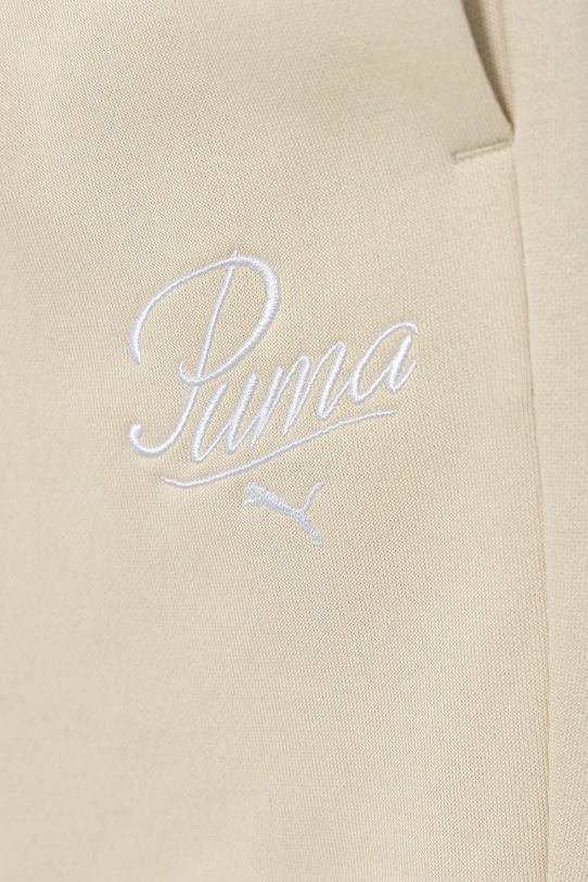 Dziewczynka Puma spodnie dresowe dziecięce ESS SCRIPT Sweatpants FL G 688729 beżowy
