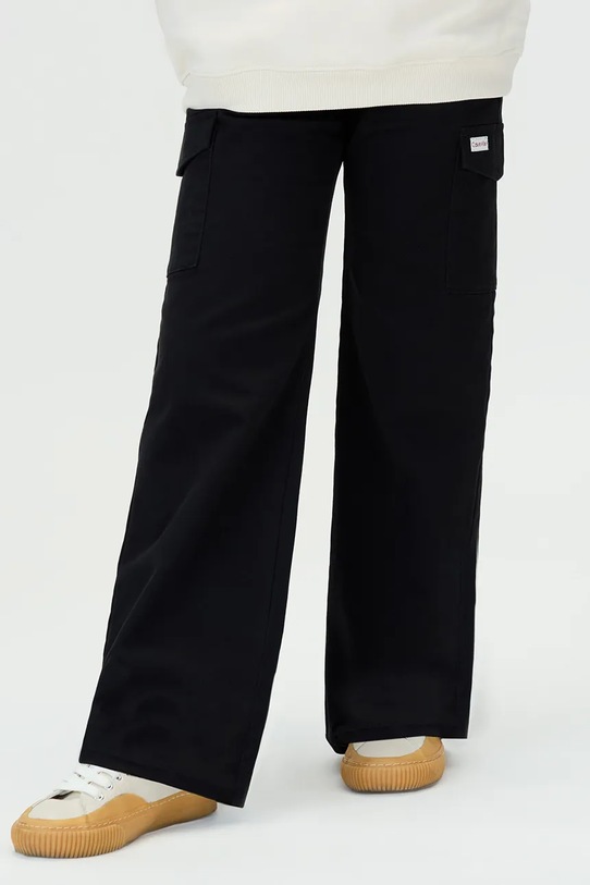 Дівчинка Дитячі штани Calvin Klein Jeans IG0IG03004.116.9BYA чорний