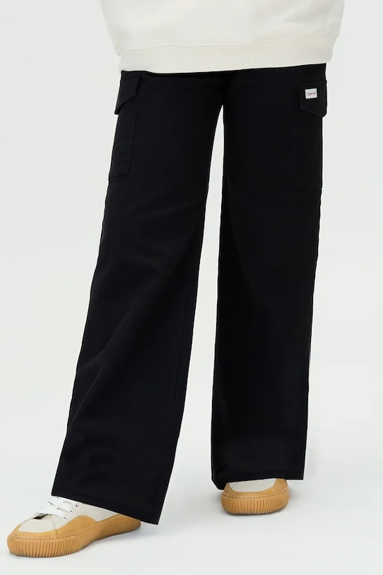 Dievča Detské nohavice Calvin Klein Jeans IG0IG03004.116.9BYA čierna