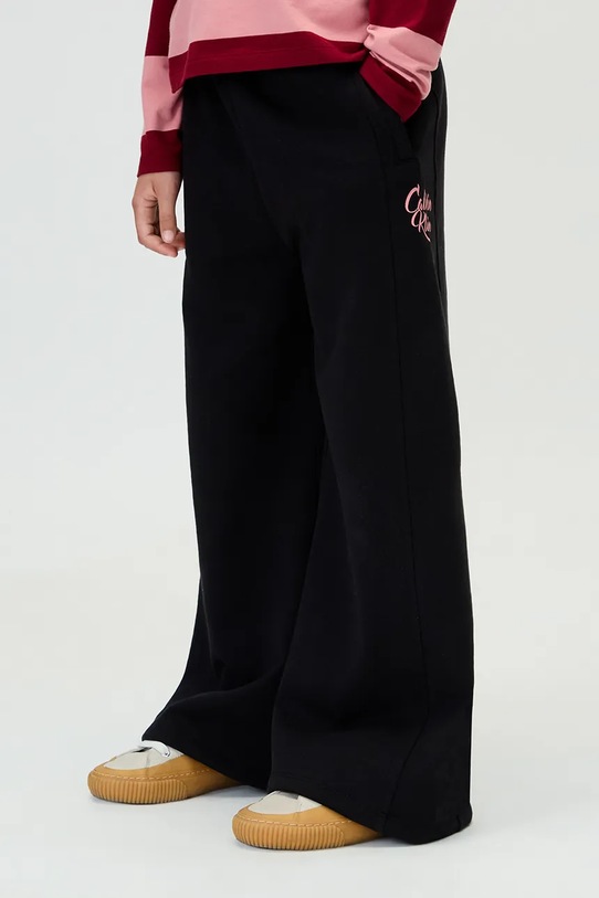 DÍVKA Dětské tepláky Calvin Klein Jeans IG0IG03024.116.9BYA černá