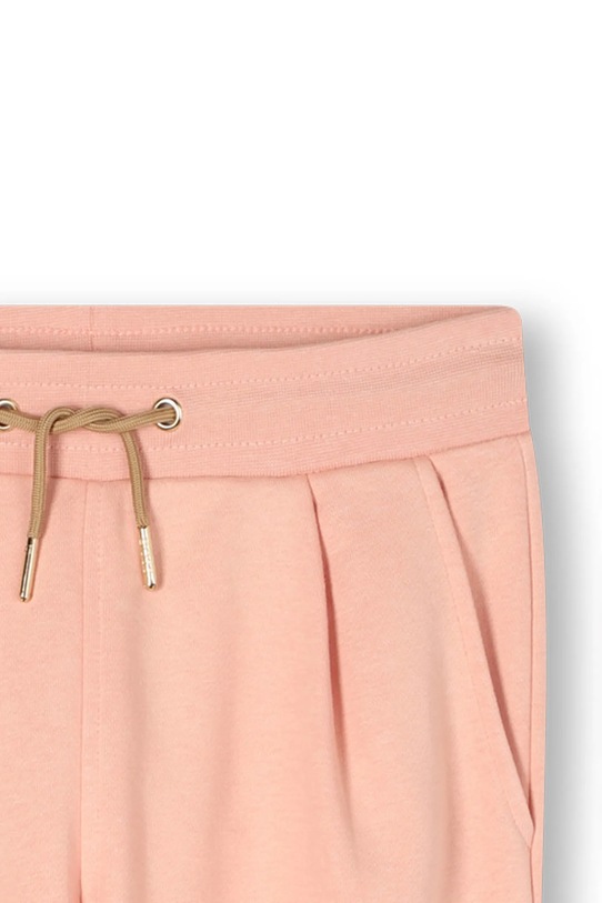 BOSS spodnie dresowe dziecięce pomarańczowy J52413.114.150