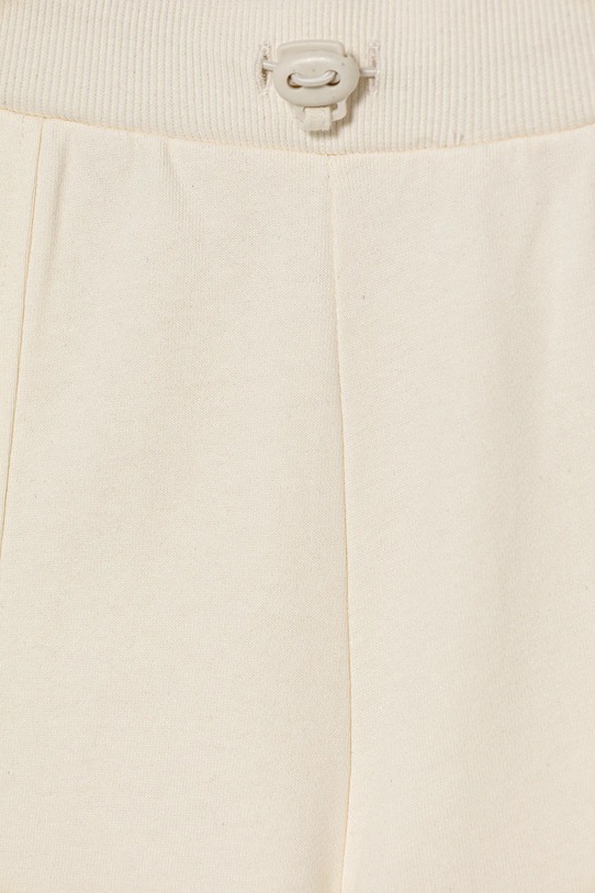 Dziewczynka United Colors of Benetton spodnie dresowe bawełniane dziecięce 3NBMCF06O.G.seasonal beżowy