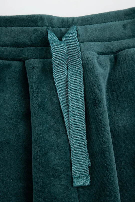 Dziewczynka Coccodrillo spodnie dresowe welurowe dziecięce ZC5120101FGJ zielony