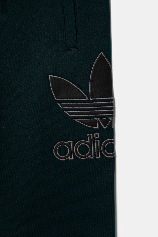 Otroška bombažna trenirka adidas Originals zelena JV8579