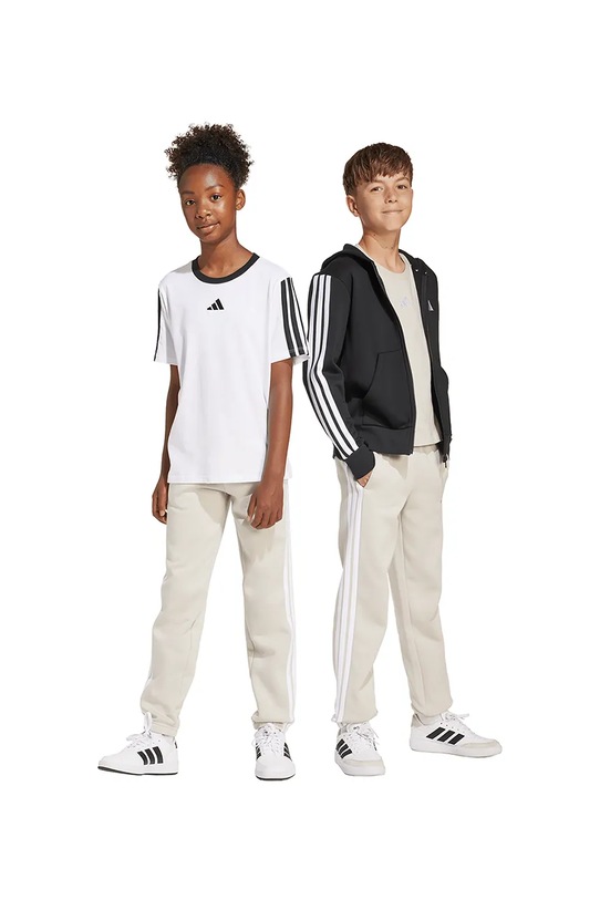 adidas spodnie dresowe dziecięce dzianina beżowy KB7309