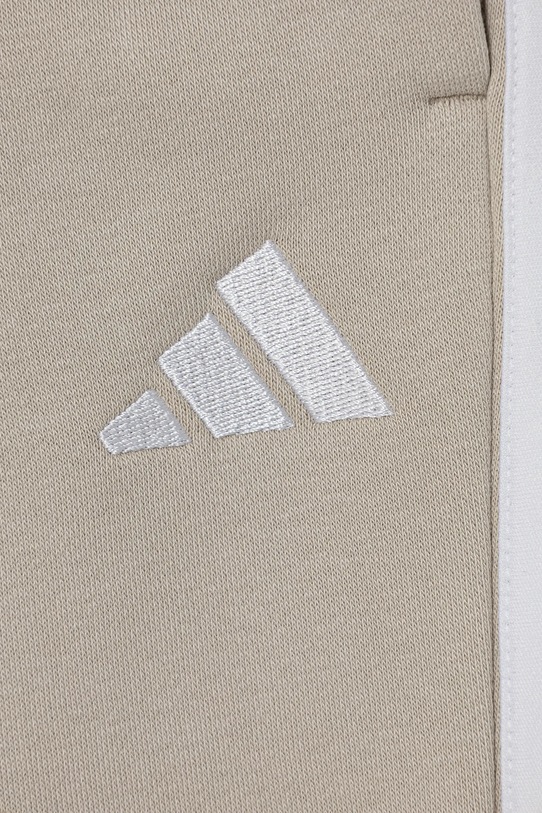 adidas spodnie dresowe dziecięce beżowy KB7309