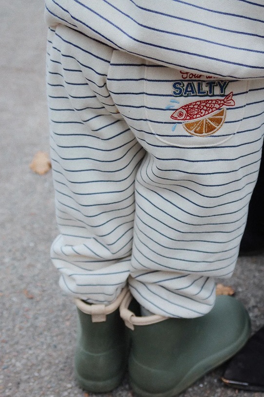 Konges Sløjd spodnie dresowe dziecięce AMIO SWEAT PANTS OCS dzianina beżowy KS103670.9BYA