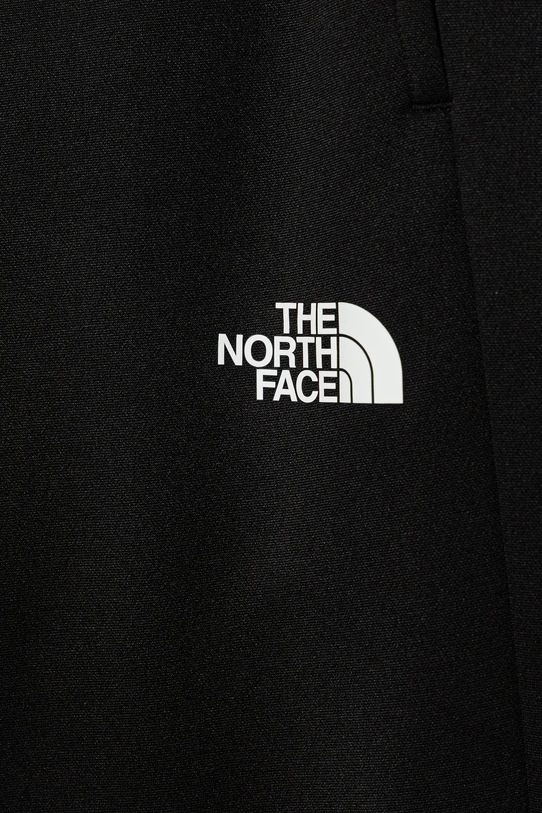Chłopiec The North Face spodnie dresowe dziecięce TEEN REAXION JOGGER NF0A8EB7JK31 czarny