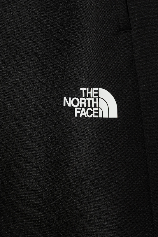Băieți The North Face pantaloni de trening pentru copii TEEN REAXION JOGGER NF0A8EB7JK31 negru