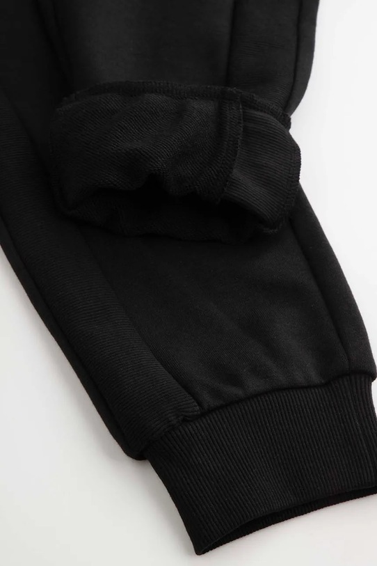 Detské tepláky Coccodrillo čierna ZC5120103YBJ