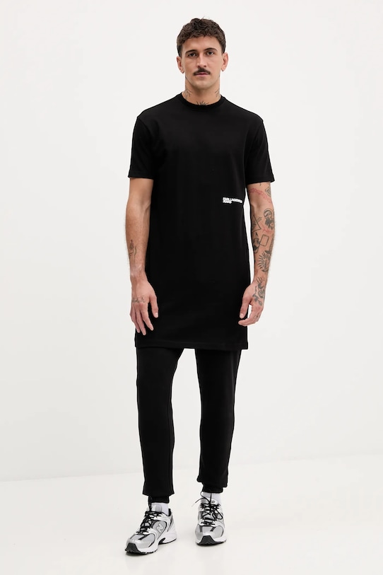 Bavlnené tepláky Tommy Jeans DM0DM22094 čierna AW25