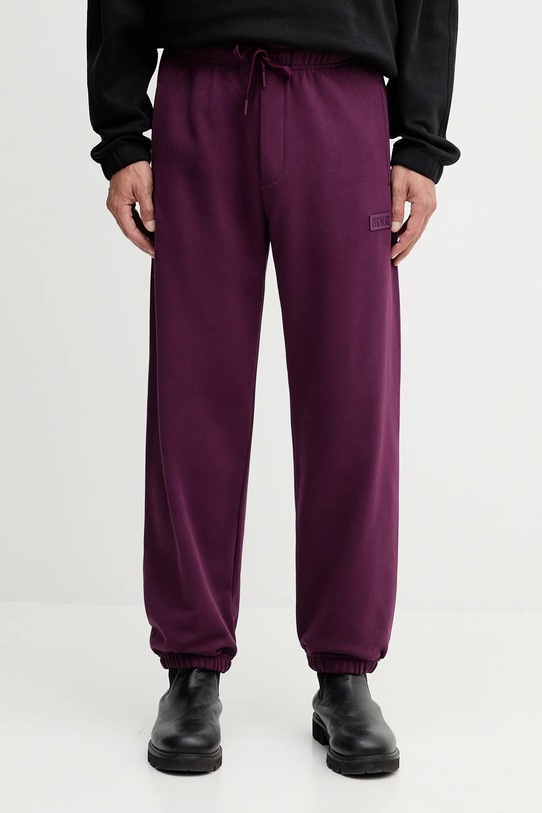 Хлопковые спортивные штаны Versace Jeans Couture хлопок фиолетовой 79GAAT07.CF01T