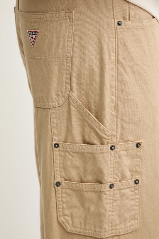 Guess Jeans spodnie bawełniane beżowy M5YB67.WHFR1